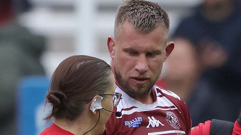 Wigan's Cooper hangs up boots after concussion scare