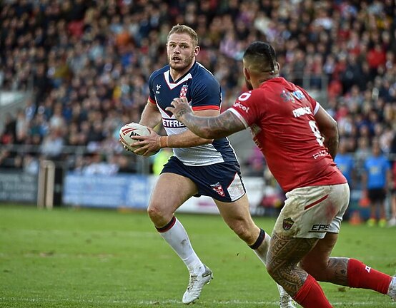 Rabbitohs prop Tom Burgess in action for England during last year's series against Tonga.