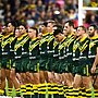 The Kangaroos line up for the anthem before this month’s clash with Samoa. (Photo by Ian Hitchcock/Getty Images)