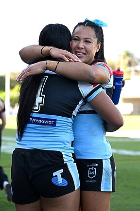 Star centres Tiana Penitani (R) and Annessa  Biddle embrace after the semi-final win over the Broncos.