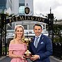 Billy Slater and Alicia Loxley hold the Melbourne Cup. Photo: Channel 9.