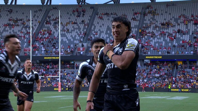 McLean reacts after scoring the opener on debut.