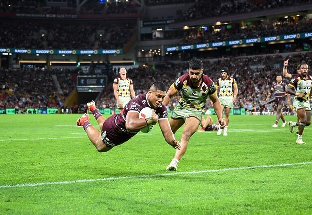 Raymond Tuaimalo Vaega dives over for a try against Brisbane in round 11