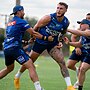 Primed and ready for a big 2025, Bronson Xerri bursts through the defence at training after getting a ball away.