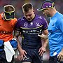 Cameron Munster is helped from the field after suffering an injury in Round 11's Magic Round match against the Eels.