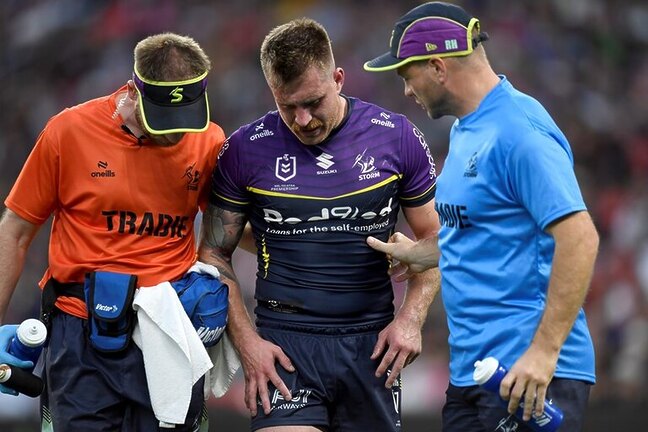 Cameron Munster is helped from the field after suffering an injury in Round 11's Magic Round match against the Eels.