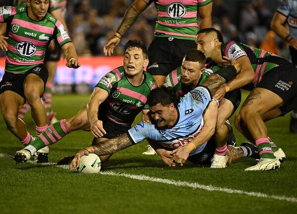 Andrew Fifita scores for the Sharks in his last season of NRL (2022). Photos: NRL