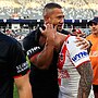 Kyle Stanley shares a moment with David Afu post-game.