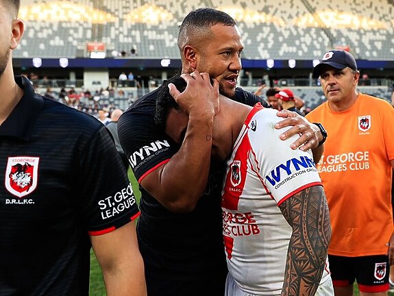 Kyle Stanley shares a moment with David Afu post-game.