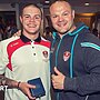 A young Jonah Cunningham stands with his dad Kieron in the changing room at St Helens