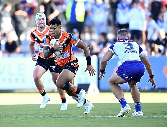 Jeral Skelton runs the ball in his first match in Wests Tigers colours