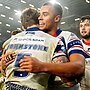 Wakefield players Corey Hall and Tom Johnstone embrace after the hooter sounded to confirm victory over Leeds in the Super League opener