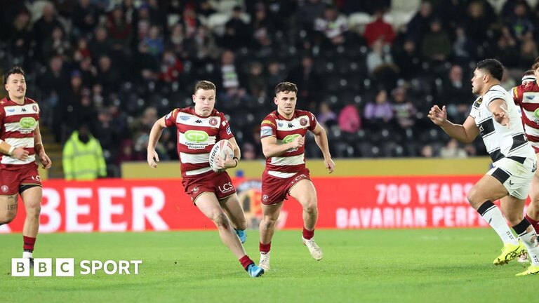 Wigan full back Jai Field drives forward against Hull