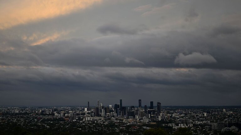 Family first as cyclone mayhem bears down on Brisbane