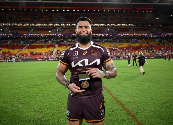 Payne Haas with the Carl Webb Medal.