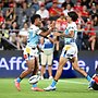 Keano Kini and Jayden Campbell celebrate during the Pre-Season Challenge.