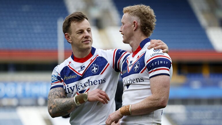 Tom Johnstone (left) and Lachlan Walmsley celebrate Wakefield Trinity's Challenge Cup victory over Huddersfield