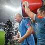 Blues players credit coach John Strange for creating a bond within the Origin series winning team.
