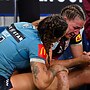 Blues captain Isabelle Kelly consoles her Maroons counterpart Ali Brigginshaw after Origin II.