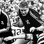 Mark Jones (centre, with ball in hand) in action for Neath against Cardiff shortly before his switch to rugby league in 1990