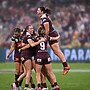 Chelsea Lenarduzzi and Queensland celebrate winning the 2024 State of Origin shield.