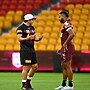 Queensland Maroons coach Billy Slater discusses plans with Hamiso Tabuai-Fidow.
