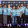 Renee Tatana and husband Kent (centre) with some of Cronulla's Junior Representative players.