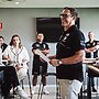 CEO Tony Mestrov talks to staff at the club's Women in League Round morning tea