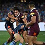 Tino Fa'asuamaleaui takes on the Blues defence in 2023.