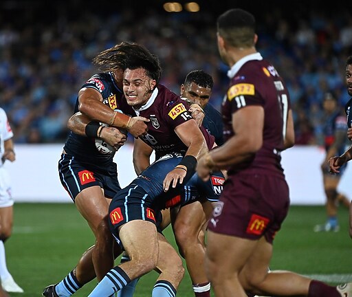 Tino Fa'asuamaleaui takes on the Blues defence in 2023.