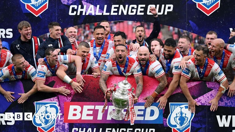 Hull KR players celebrate winning the Challenge Cup