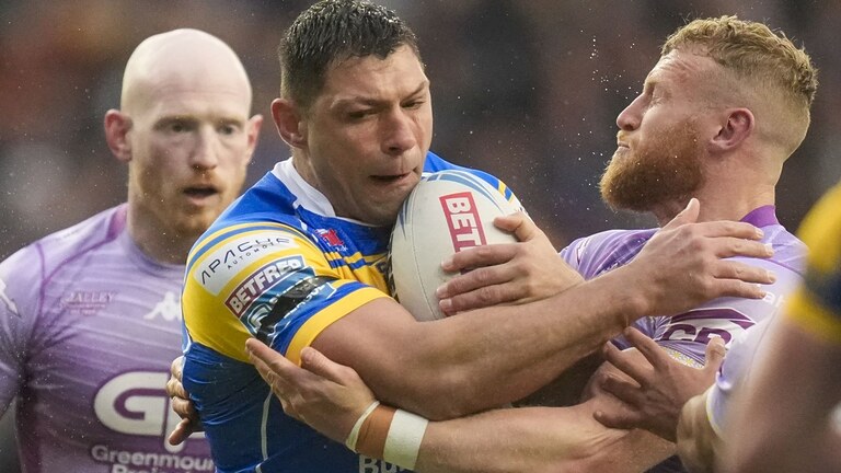 Leeds Rhinos' Ryan Hall is tackled during the Betfred Super League match at the AMT Headingley
