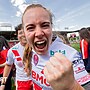 St Helens winger Dani McGifford roars happily into the camera with a fist punching the air in delight after a Challenge Cup semi-final win over York