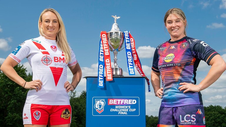 Picture by Allan McKenzie/SWpix.com - 02/06/2025 - Rugby League - Betfred Challenge Cup Final Preview - Oulton Hall, Rothwell, England - St Helens' Jodie Cunningham & Wigan's Vicky Molyneux with the Women's Betfred Challenge Cup trophy.