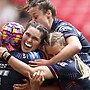 Naomi Williams celebrates scoring a try during the Women's Challenge Cup final