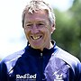 Players urge coaching legend to stay on