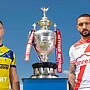 Warrington's George Williams with Hull KR's Elliot Minchella and the Challenge Cup trophy