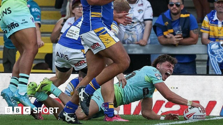 Owen Dagnall touching the ball on the try line