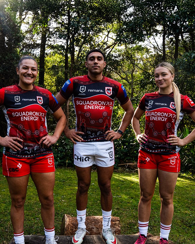 Proud Wiradjuri and Dunghutti woman Ahlivia Ingram, proud Wiradjuri man Tyrell Sloan & proud Gweagal and Wiradjuri woman Ella Koster pose in the club's 2025 Indigenous Jersey.