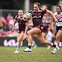 Lauren Dam runs the ball for the Broncos.
