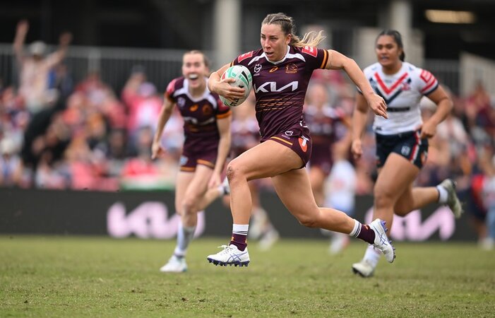 Lauren Dam runs the ball for the Broncos.