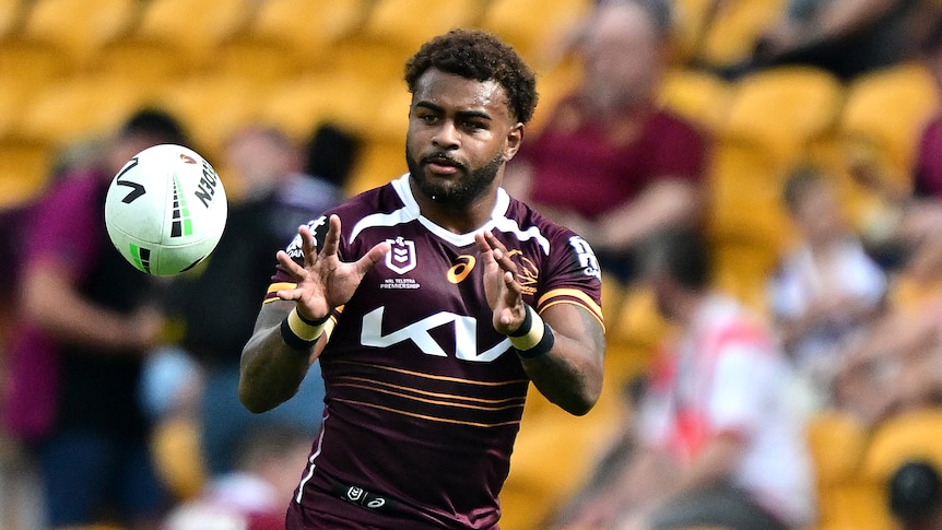 Ezra Mam of the Broncos catches the ball during the warm up
