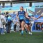 Megan Pakulis runs out for her first game of NRLW.