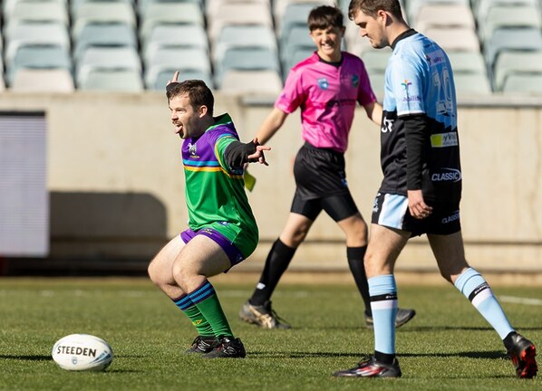 The Score Raiders are playing the Sharks before the NRLW match and the players are getting into the Try July celebrations.