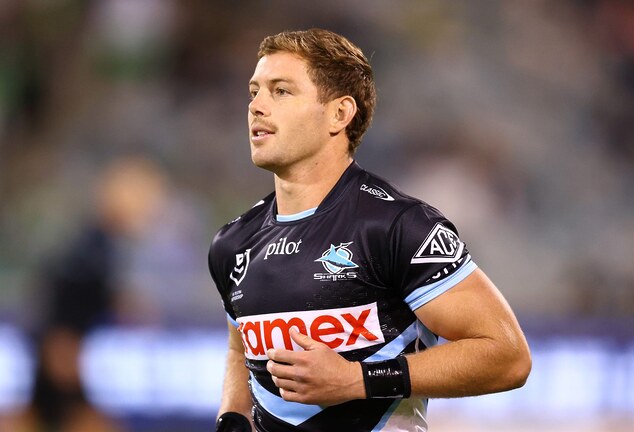 Sharks reel in Brailey before he swims away