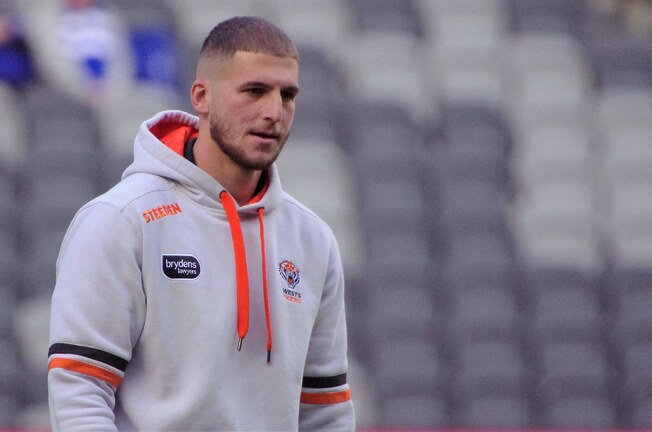 Tigers' star checks out as Moses signs on the dotted line