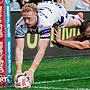 Lachlan Walmsley diving in the corner to score