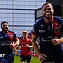 Hull Kingston Rovers winger Joe Burgess celebrates a try against Salford Red Devils with teammate Peta Hiku