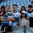 Caitlan Johnston-Green with daughter Amarah and family members after making her return in Indigenous Round for the Sharks.