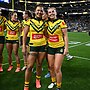 Sharks duo Tiana Penitani Gray and Quincy Dodd after the Jillaroos triumph in Vegas.